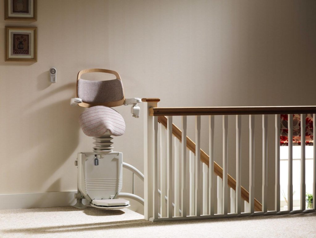 A curved Stannah stairlift UK for temporary home mobility support